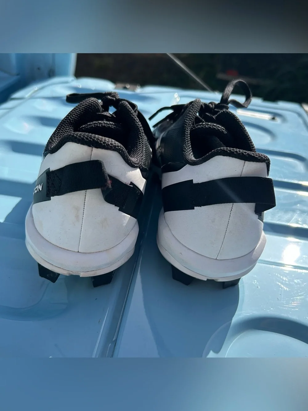 adidas Men’s Black and White ICON Athletic Cleats